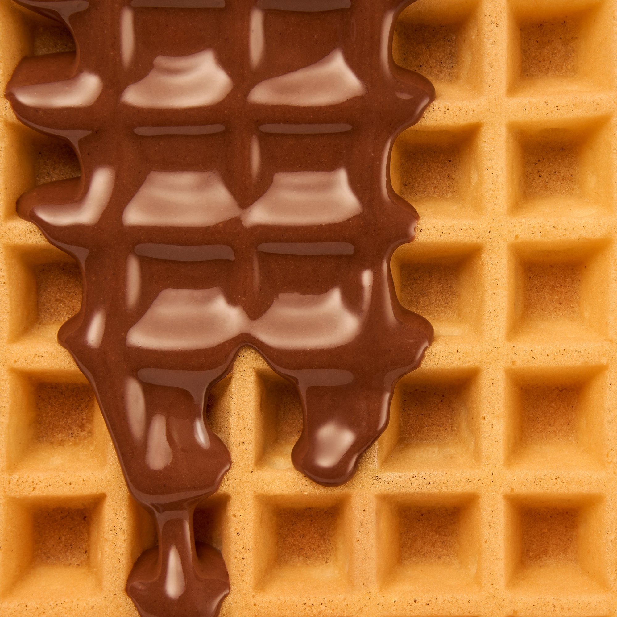 Waffle with chocolate drip, top-down